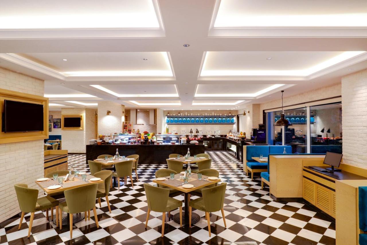 Отель Lemon Tree Premier, Mumbai International Airport Экстерьер фото